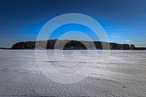 Falun - March 31, 2018: Panorama of the frozen lake of Framby Udde near the town of Falun in Dalarna, Sweden