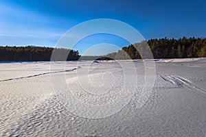 Falun - March 31, 2018: Panorama of the frozen lake of Framby Udde near the town of Falun in Dalarna, Sweden