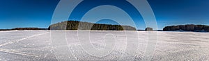 Falun - March 31, 2018: Panorama of the frozen lake of Framby Udde near the town of Falun in Dalarna, Sweden