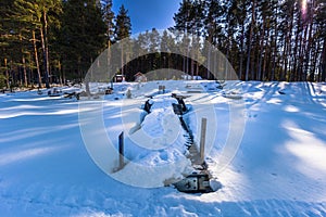 Falun - March 31, 2018: Small frozen pier at Framby Udde near the town of Falun in Dalarna, Sweden