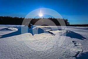 Falun - March 31, 2018: Panorama of the frozen lake of Framby Udde near the town of Falun in Dalarna, Sweden