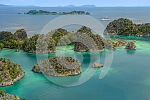 Fam Islands, Piaynemo, Raja Ampat, West Papua, Indonesia. Blue lagoon, green Islets, tropical paradise