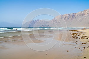 Famara Beach Playa de Famara, popular surfing beach in Lanzarote.