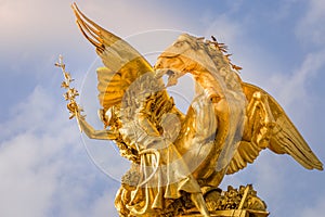 Fame Sculpture in Pont Alexandre III at sunny day, Paris, france