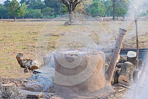 The famer practise how to burn charcoal,ancient method to made char in Thailand.