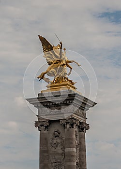 `Fames`, gilt-bronze statues of Fames over the Pont Alexandre III deck arch bridge