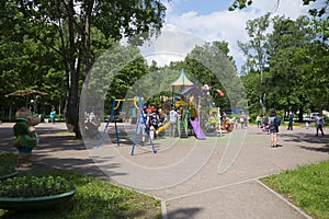 Families with children playing on the Playground in the Park of Zelenogorsk. Saint Petersburg