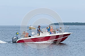 Families in leisureboat Oregrund Sweden