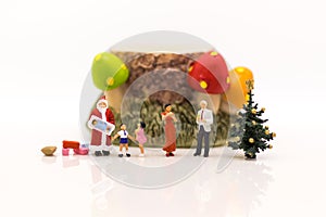 Families spend time together, happily partying on Christmas day. Image use for family day