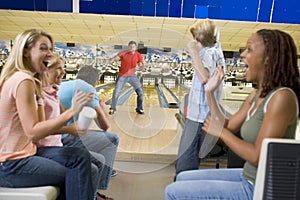 Families on trip to bowling alley