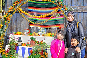 A family and African fruit stall