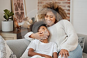 Family, African mother and daughter with hug, home and portrait of love on couch, happiness and lounge. Black woman