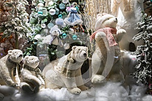 Ð family of artificial polar bears with scarves.