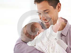 Family, baby and dad in home with love, hug and care together with parent and bonding. Relax, father and happy in a