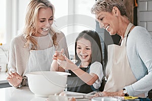 Family, baking and child helping mother and grandmother with cooking with an egg in bowl for future as chef or baker