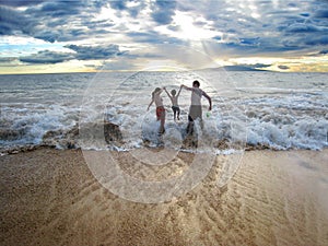 Family on the beach photo