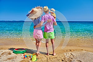 Family on beach in Greece. Summer vacation