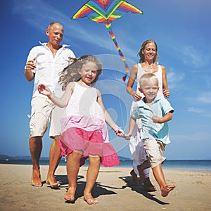 Family Beach Holiday Flying Kite Sea Togetherness Concept