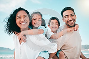 Family on beach, parents piggyback children in portrait with bonding on holiday, happy people and smile with travel. Mom