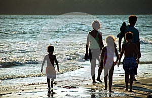Family on Beach at Sunset