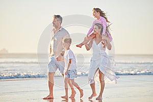 Family, beach and walking kids on sand in nature for summer spending quality time. Sea water, ocean waves and walking of