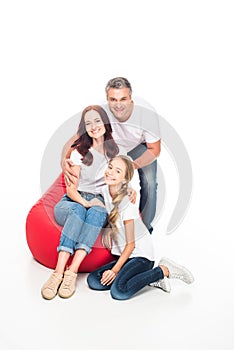 Family on bean bag chair