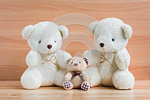 Family bears on a wooden background