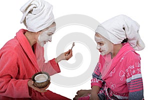 Family beauty treatment in the bathroom. mother