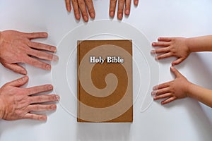 Family bible hands