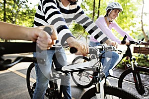 Family on a bike ride in the park