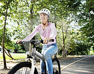 Family on a bike ride in the park