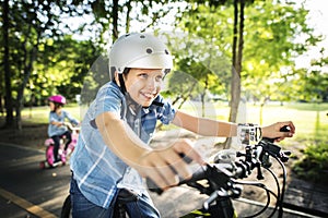 Family on a bike ride in the park