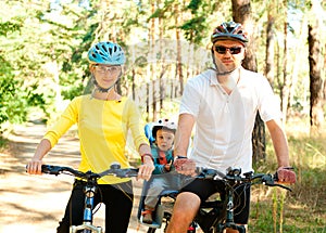 Family on the bike in the sunny