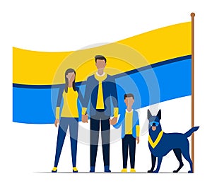 Family in blue and yellow clothing with dog standing before large flag. Patriotic family portrait with pet, unity and