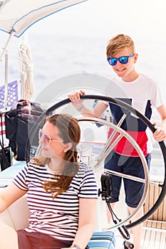 Family on board of sailing yacht