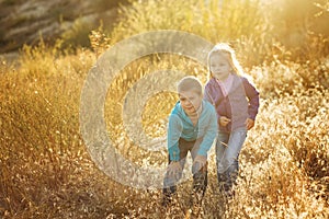 Family. Brother and sister outdoors