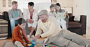 Family, building blocks and a grandfather playing with his grandkid in the living room of a home during a visit. Kids