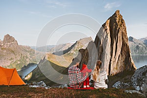 Family camping mother and father with baby travel vacations