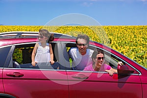 Family car travel on vacation, happy parents with kid having fun in auto driving