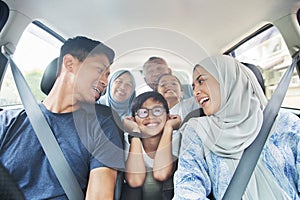 Family in a car for a trip