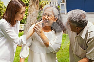 The family cared for each other, with a daughter and father taking care of mother who fainted during a walk in the park.