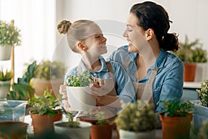 Family caring for plants