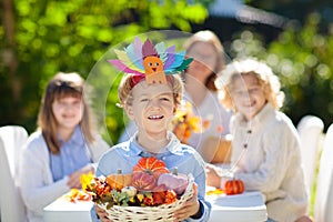 Family celebrating Thanksgiving. Kids crafts