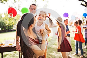 Family celebration or a garden party outside in the backyard.