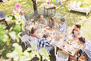 Family celebration or a garden party outside in the backyard.