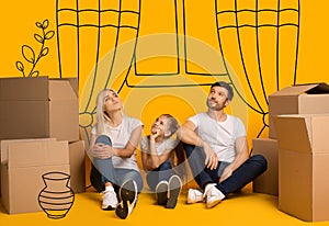 Family with child dreaming about new furnished apartment on orange background with doodle drawings