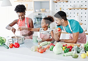 family child kitchen food daughter mother father cooking preparing breakfast happy together