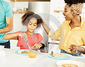 family child kitchen food daughter mother love eating preparing pancake breakfast happy together black dessert