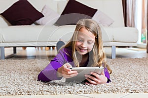 Family - child playing with Tablet computer pad