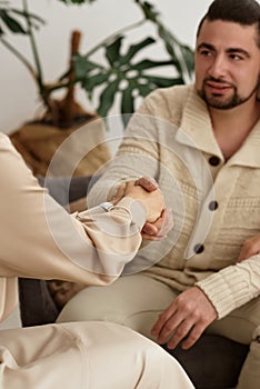 Family with a child at a psychotherapist at the reception